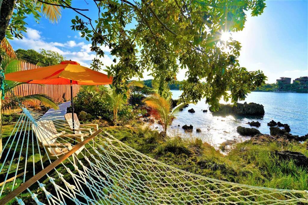 The Dock Resort Over Water Retreat West End Bagian luar foto